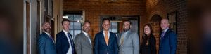 Kurt Zaner, center, with colleagues at Zaner Law's Denver office