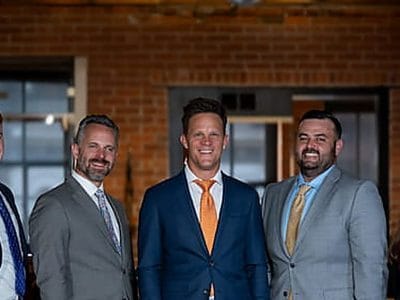 Kurt Zaner, center, with colleagues at Zaner Law's Denver office